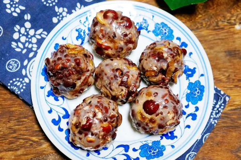 粘豆包和米饭哪个热量高