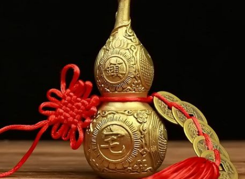 家里挂铜葫芦好还是真葫芦好