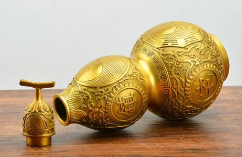 家里挂铜葫芦好还是真葫芦好