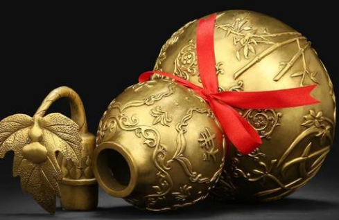 家里挂铜葫芦好还是真葫芦好