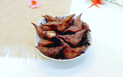 煮菱角放糖还是醋好吃