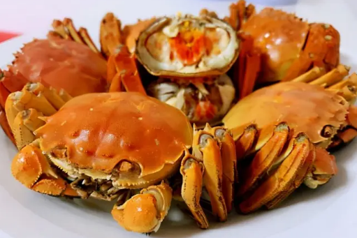 吃了螃蟹又吃了柿子怎么办