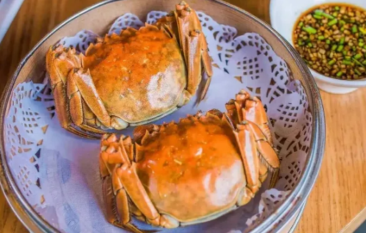 大闸蟹和葡萄一起吃了怎么办