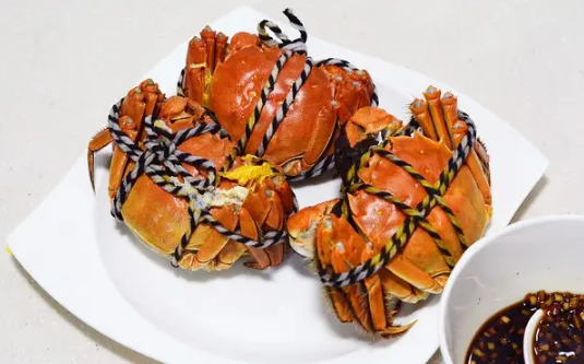 隔夜的螃蟹第二天早上热一下可以吃吗